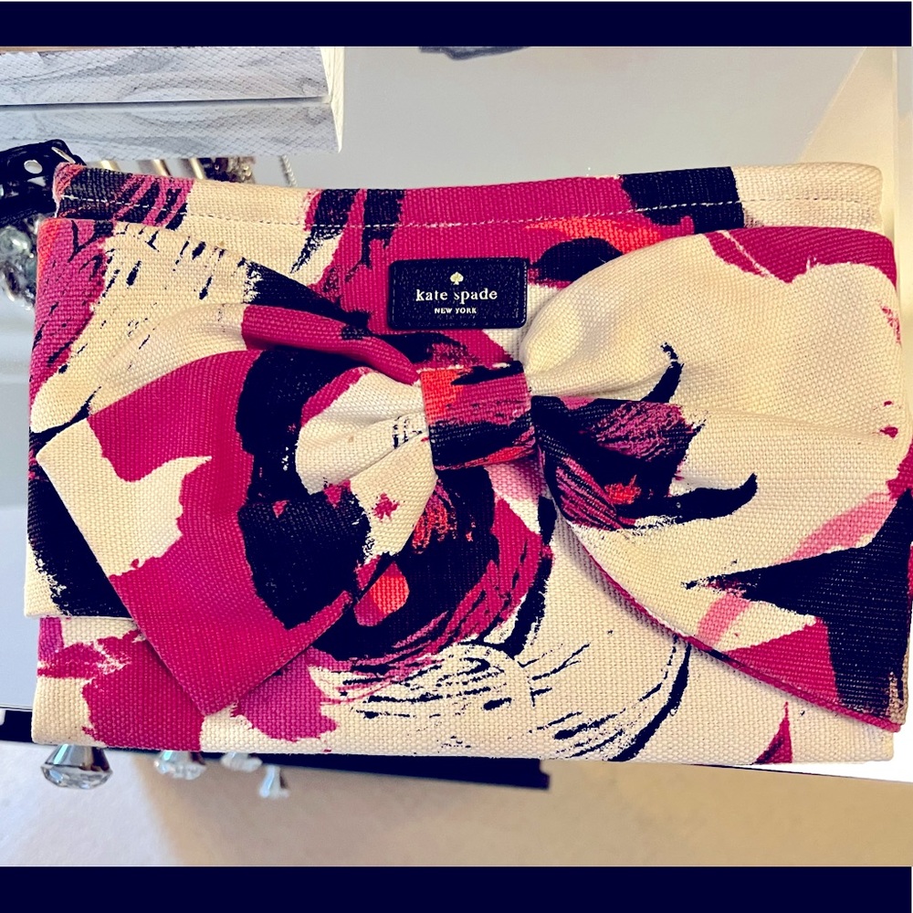Kate Spade Boutique collection floral Clutch in canvas material.